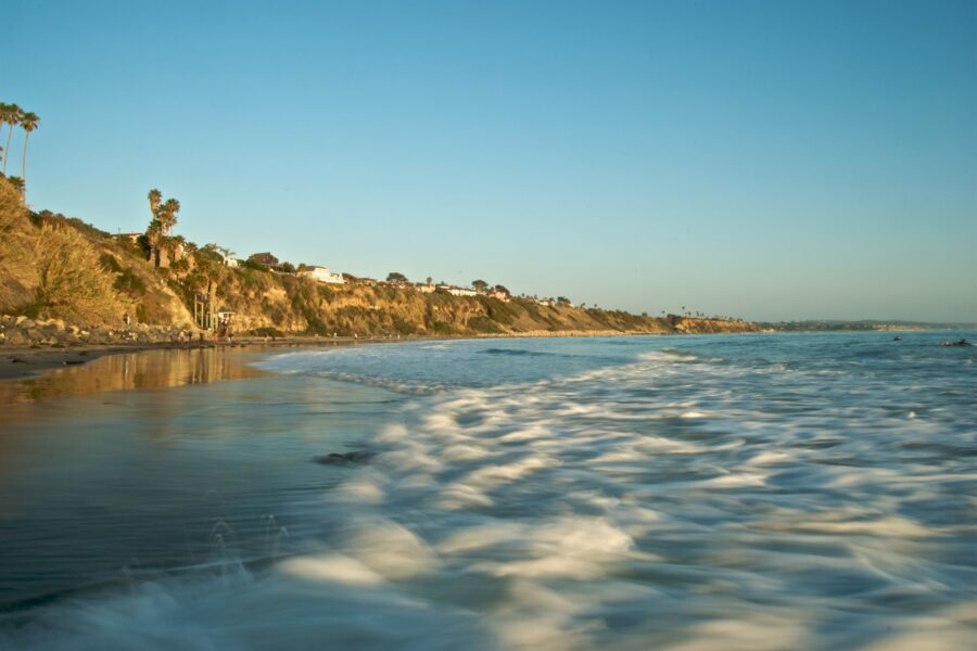 Pacific Ocean view across hills along the North County San Diego coast. Photo via Unsplash.